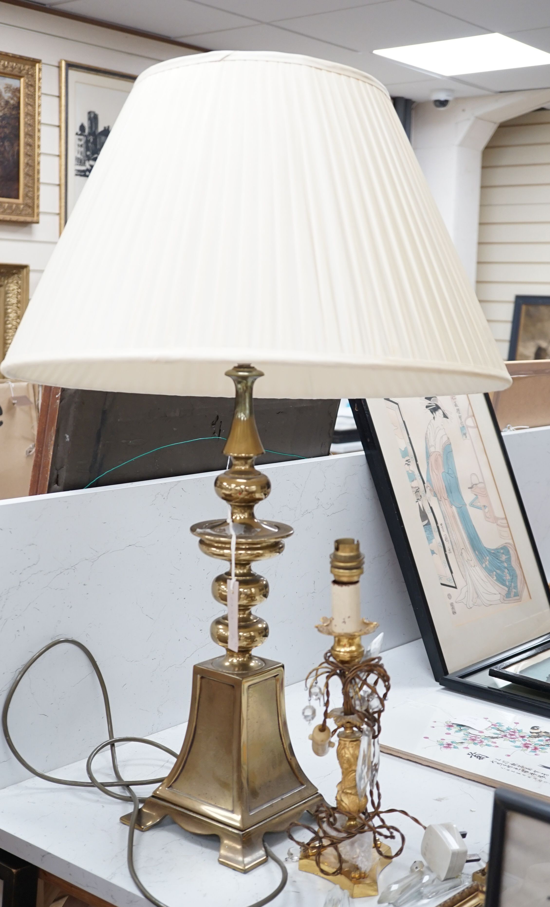 A large brass table lamp and a gilt metal and lustre hung table lamp, table lamp 50 cms high not including light fitting.
